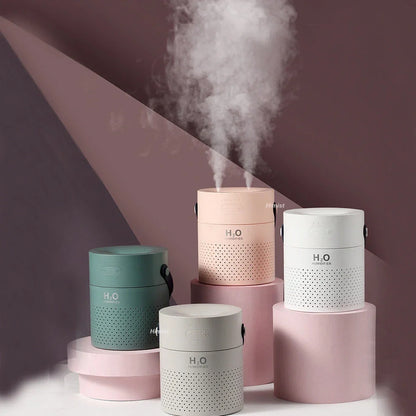 Alana wireless humidifier with green casing, dual mist nozzles, and 1100ml transparent water tank