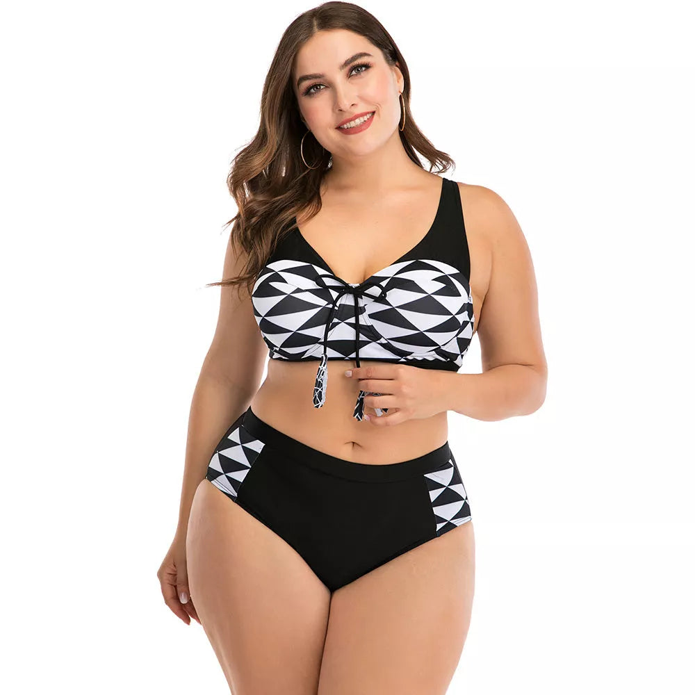 Big cup ladies swimsuit in black, made with durable nylon fabric for support and style