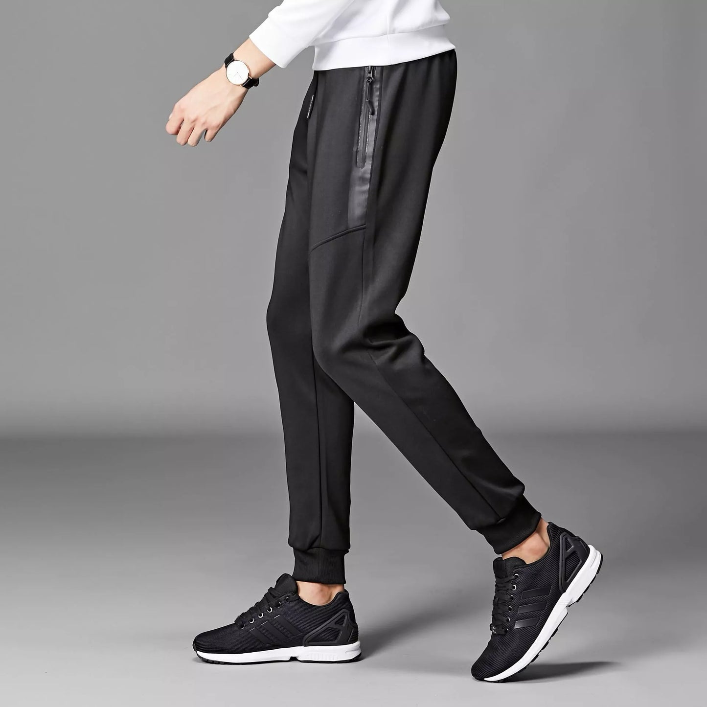 Men's winter sports pants in black and grey, made with South Korean silk fabric for warmth and flexibility