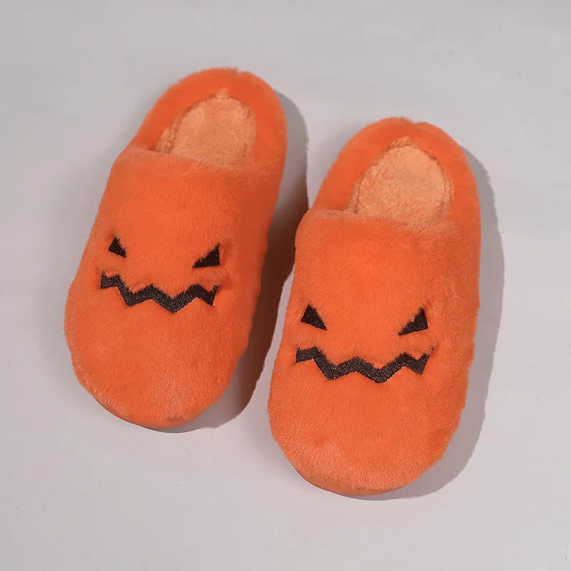 Orange Halloween pumpkin slippers with plush lining and non-slip PVC soles in UK sizes