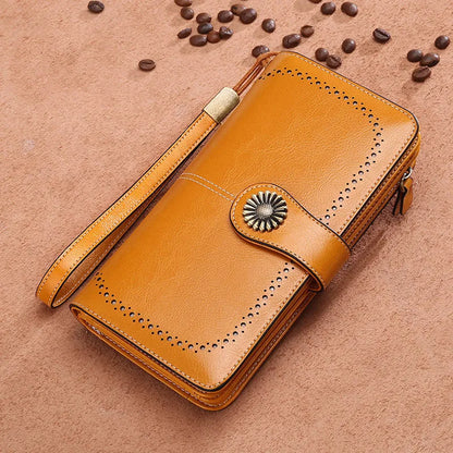 Women's long zipper clutch wallet in bovine split leather with polyester lining, vertical square shape, available in Black, Green, Red, and Yellow.