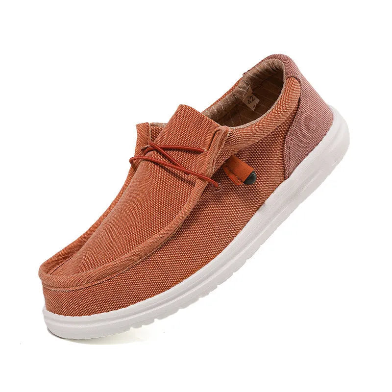 Men's green canvas sneakers with rubber sole and colour mosaic detail on round toe design