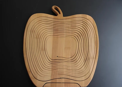 Folding natural bamboo fruit basket open at 27 cm wide, 30 cm high, collapsed to 1.8 cm for storage