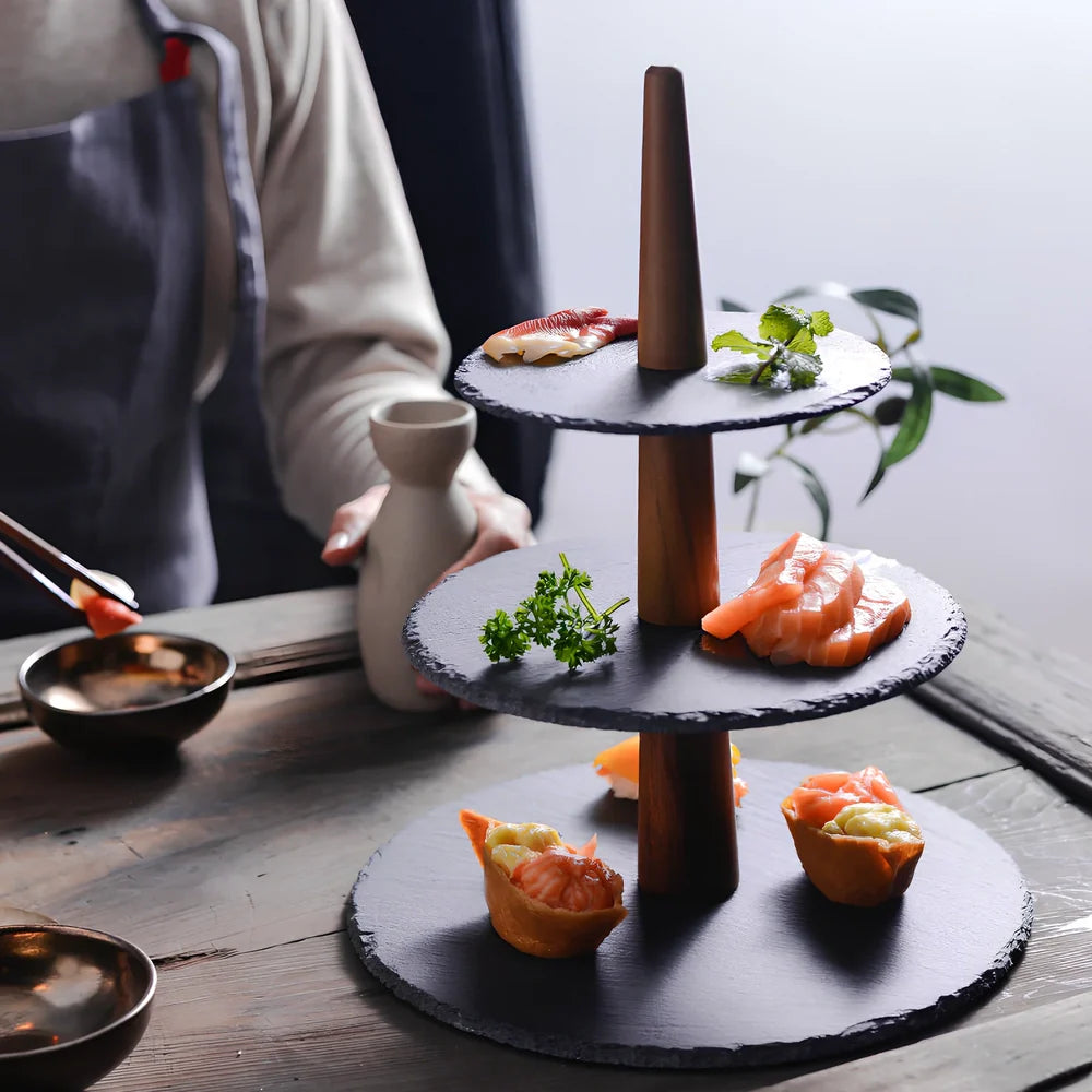 Wooden multi-layer cake plate with hand-painted decoration showing three round serving levels