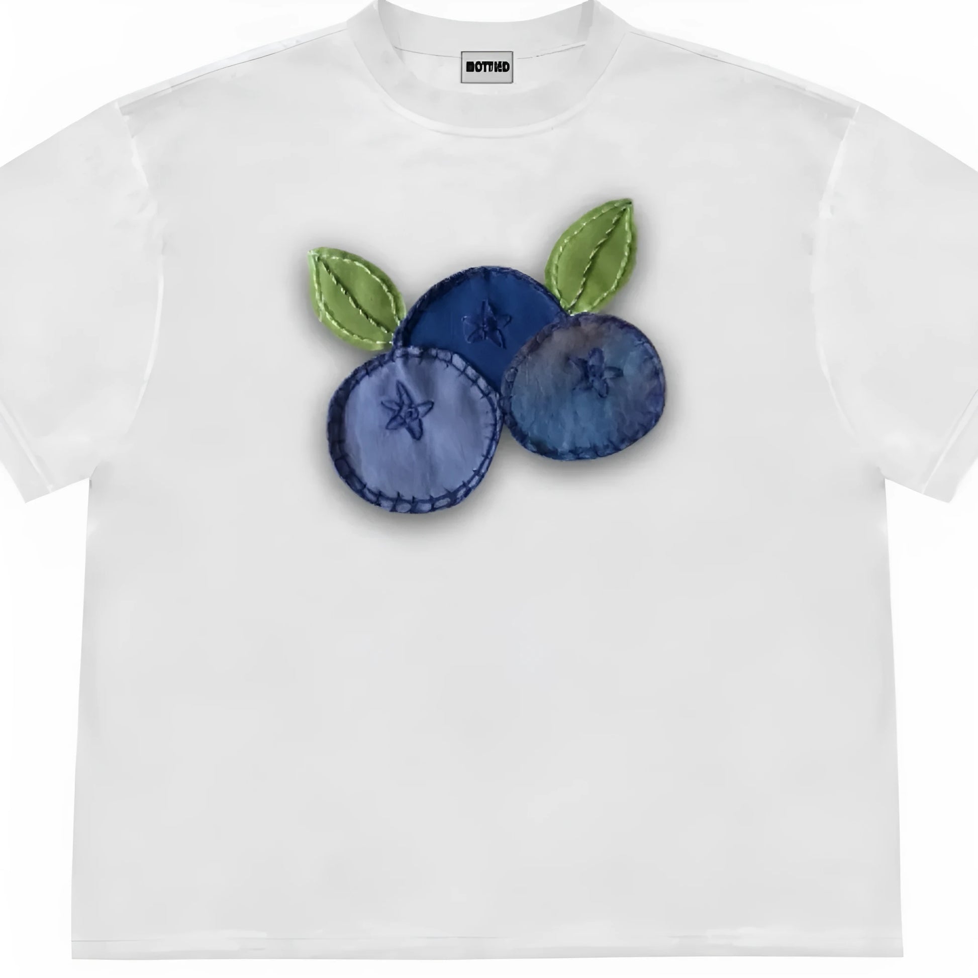 Blueberry and plant patchwork pattern on a loose-fit short sleeve Ice Oxygen Cotton T-shirt.