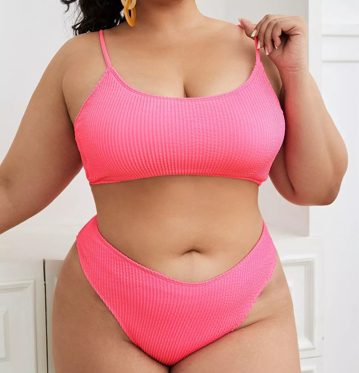 Plus-size solid pink bikini swimsuit with chest pad, available in sizes L to 4XL