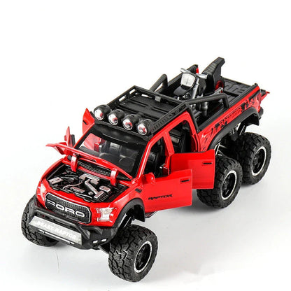 Realistic 1:28 scale Ford Raptor toy car with alloy body, lights, sounds, and pull-back action feature