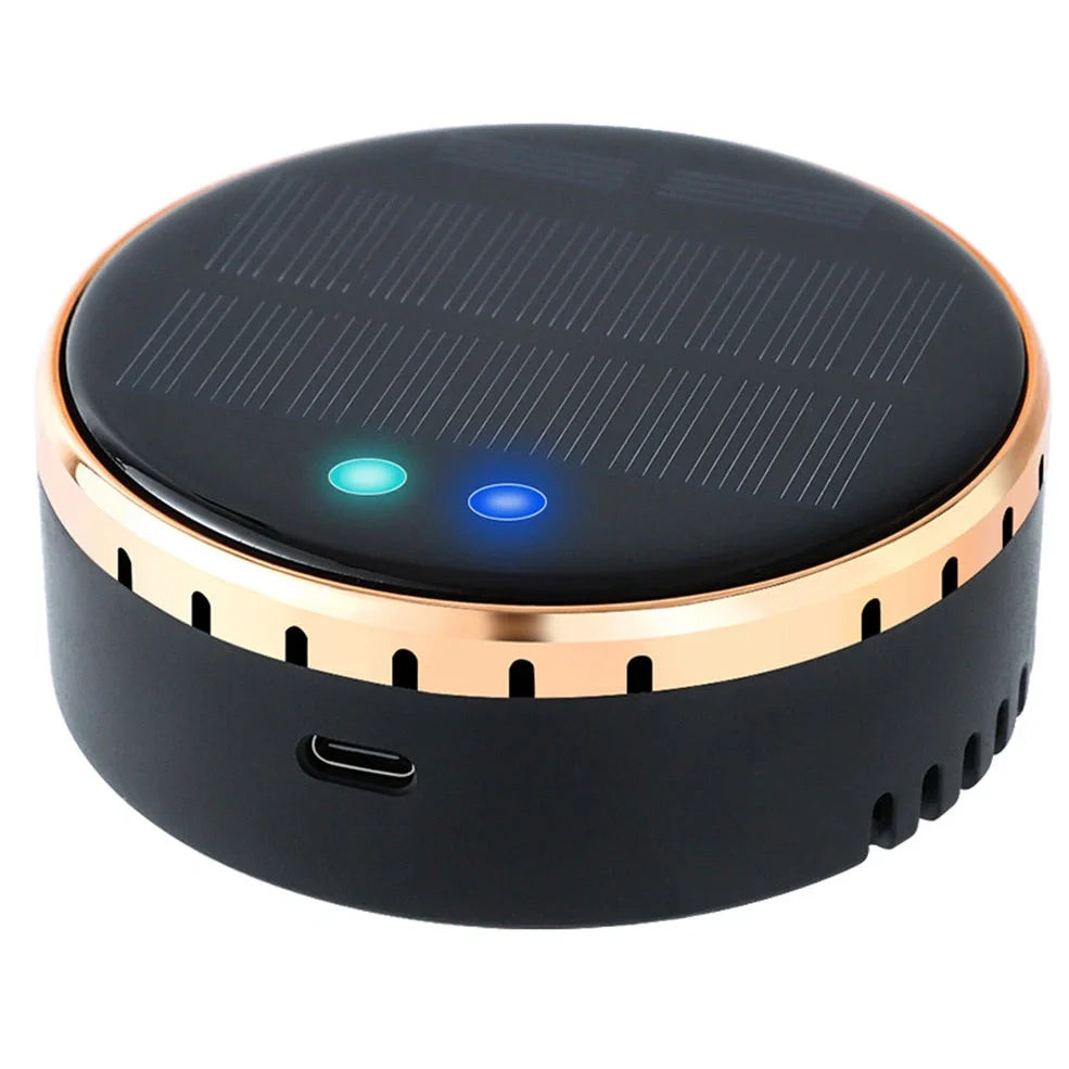 Black solar-powered car humidifier mounted on air conditioning vent with water mist visible