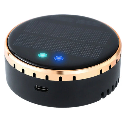 Black solar-powered car humidifier mounted on air conditioning vent with water mist visible