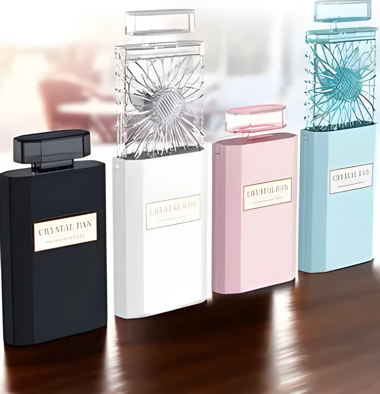 Pink coloured personal perfume fan with USB charging port for aroma diffusion.