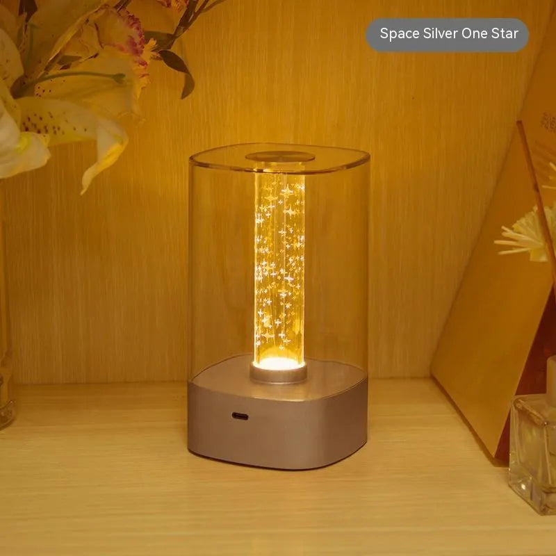 Rose Gold LED touch atmosphere lamp with abstract pattern on bedside table
