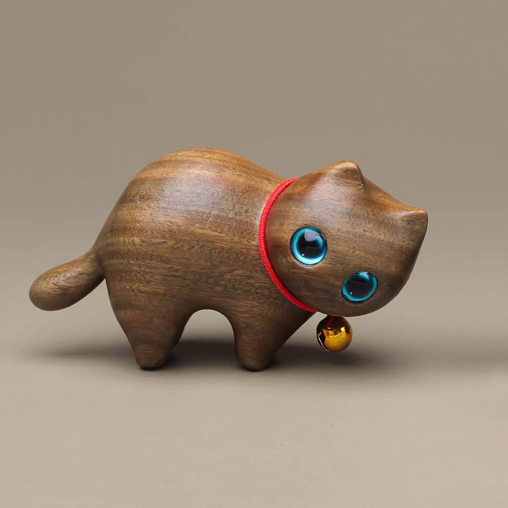 Handmade green sandalwood kitten ornament with unique design