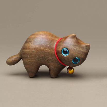 Handmade green sandalwood kitten ornament with unique design