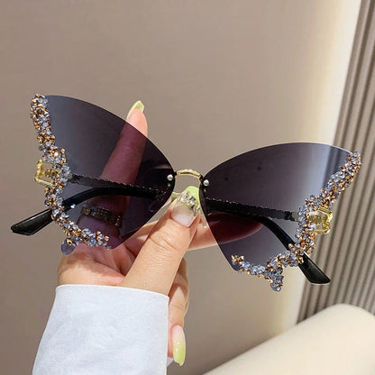 Luxurious diamond-studded butterfly sunglasses with oversized frames and a variety of color options
