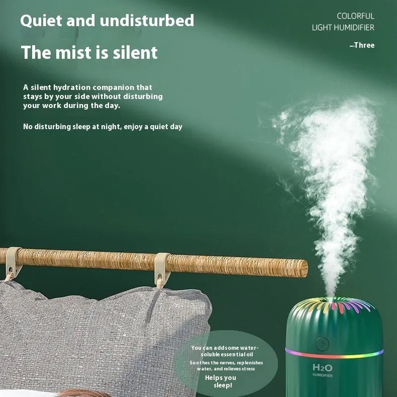 Mini USB aromatherapy humidifier in green, pink or white with 75x75x116mm dimensions and 0.5L water tank