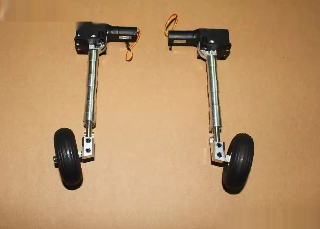 Retractable alloy landing gear for RC plane with shock absorber and large wheel.