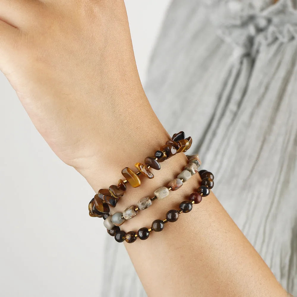 Brown geometric tigereye and bronze bracelet with textured bends and hitches detailing