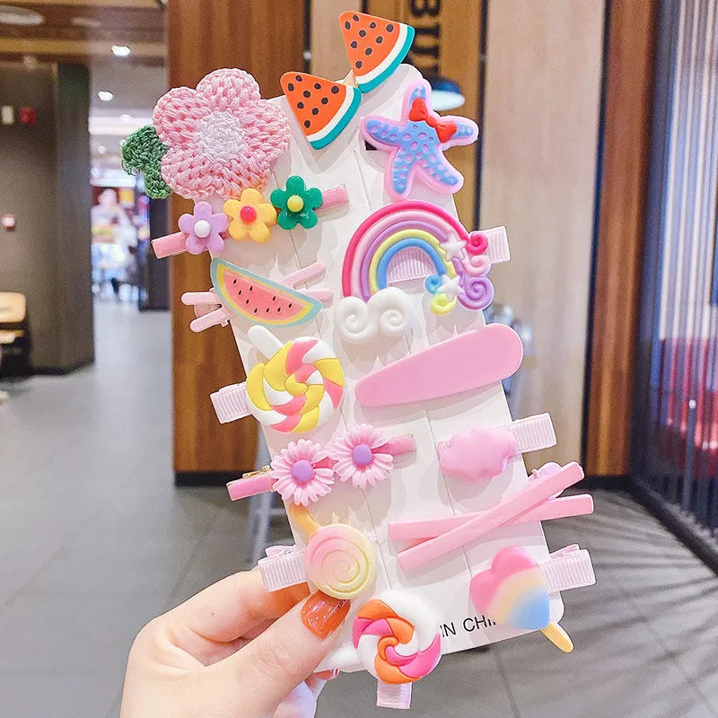 14-piece toddler hair accessories set showing colourful candy rainbow barrettes, fruit clips, and butterfly hair pins