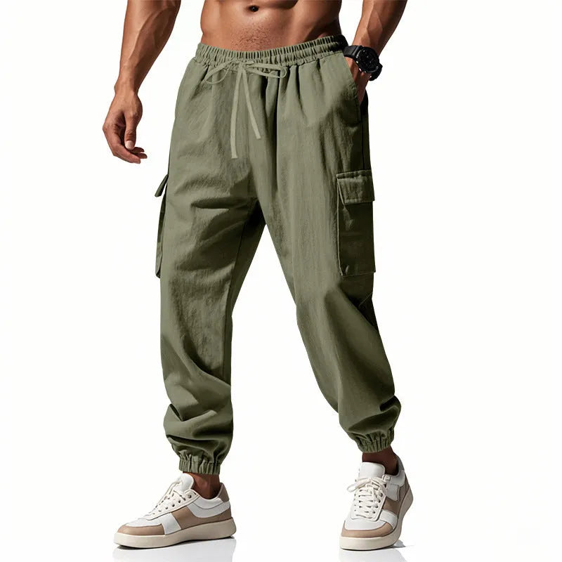 Men's linen trousers with ankle ties and multiple pockets in solid colour