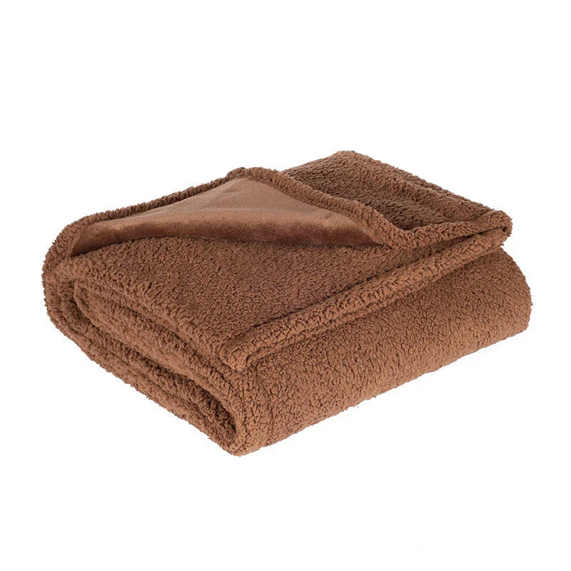 Cozy pet blanket made from soft flannel, wool, and sherpa in various colors and sizes