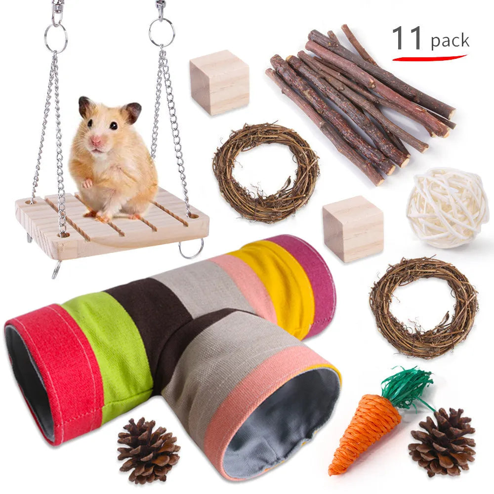 Assortment of wooden and natural fibre chew toys for small pets including balls, rings and woven shapes.