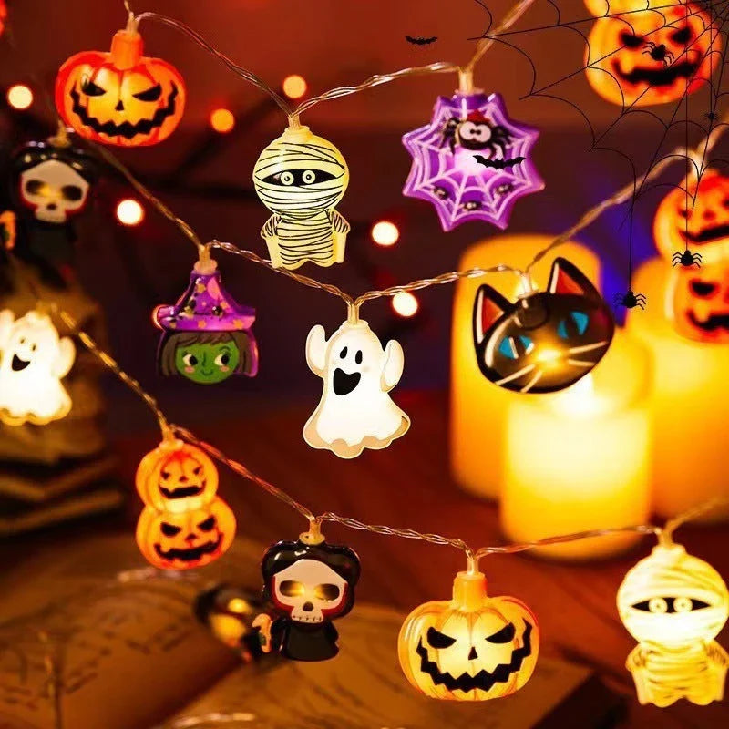 Warm glowing Halloween lighting chain with pumpkins, ghosts, and bats for indoor and outdoor decoration