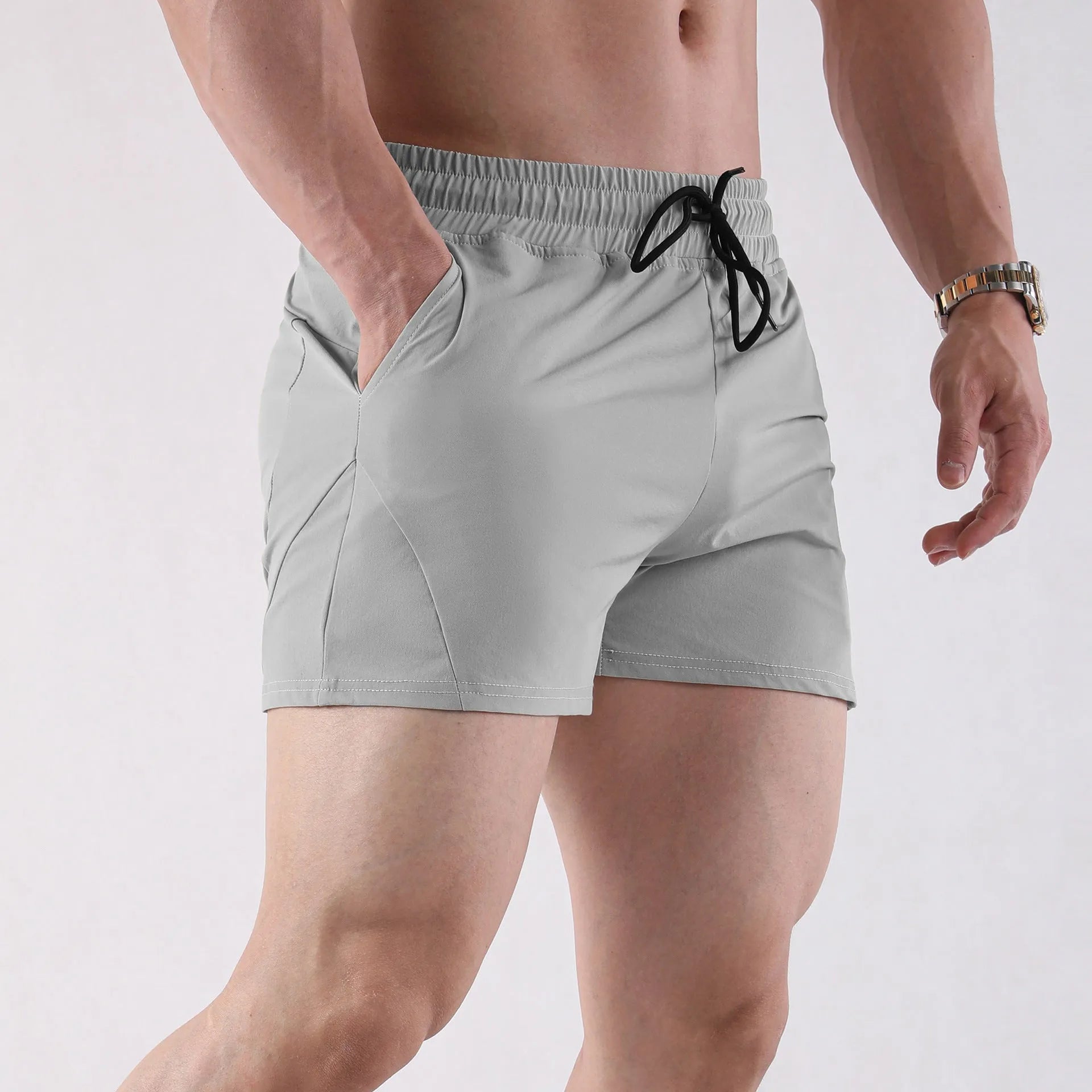 Men's grey polyester basketball shorts with elastic waistband for summer sports wear