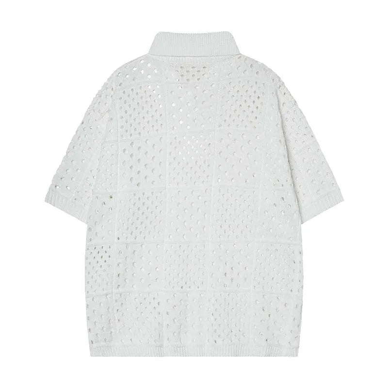 Knitted polo shirt short sleeve in solid black colour showing loose fit design