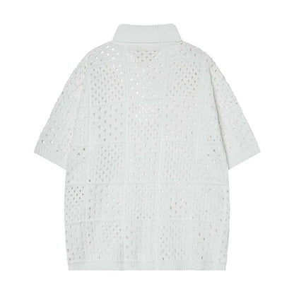 Knitted polo shirt short sleeve in solid black colour showing loose fit design