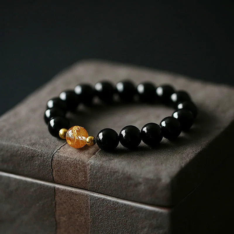 Geometric obsidian black agate white crystal bracelet with golden dragon charm on 14-16cm wrist