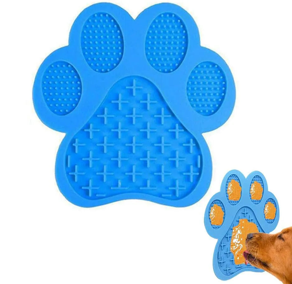 Blue bone-shaped dog licking mat with suction cups on a smooth surface, measuring 18x18cm