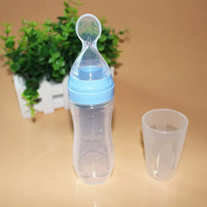Baby Spoon Bottle Feeder in various colors for easy, safe baby feeding