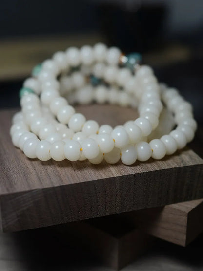 White jade bodhi seed bracelet with 108 flat round oblate beads