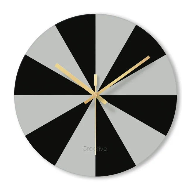 A large, clear tempered glass wall clock with a minimalist transparent face on a light background.