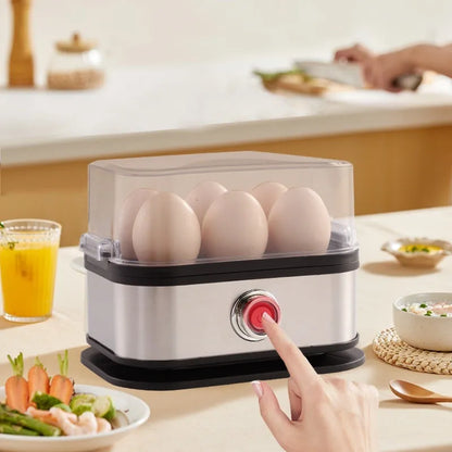 Black stainless steel portable egg boiler with power cord and international adapters for American, European, British standards