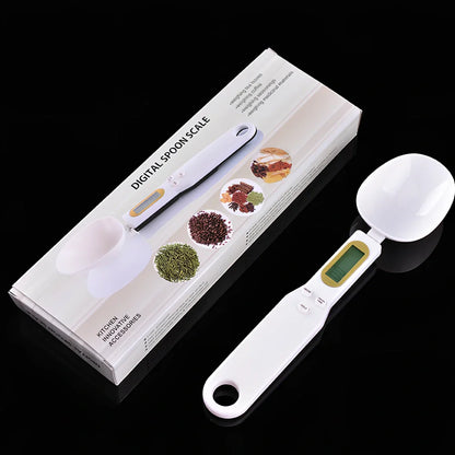 Digital kitchen spoon scale showing measurement display and USB charging port