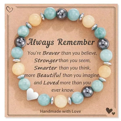 Handcrafted natural stone Tree of Life bracelet with pink zebra design