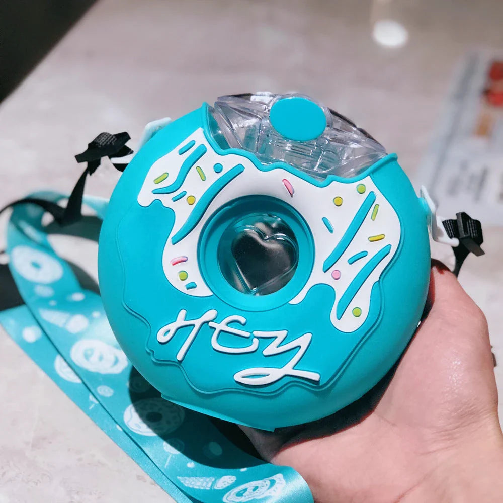 Donut-shaped water bottle with straw in various fun color options, perfect for on-the-go hydration