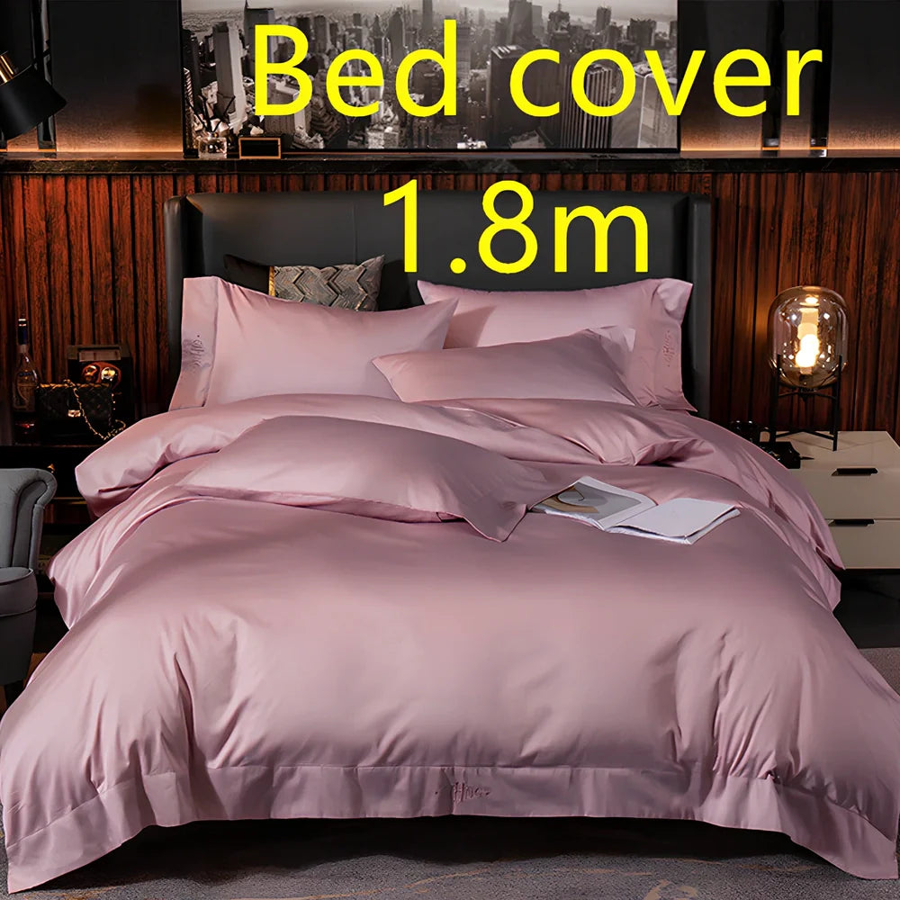 Four-piece quilted cotton bed set in royal blue, showing 200x230 cm cover and 48x74 cm pillowcases for 1.5m bed