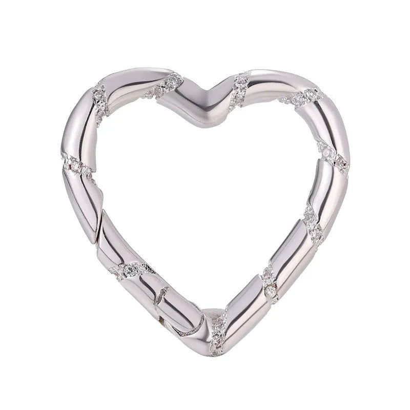 Copper heart-shaped climbing button with gold plating and zircon detail, measuring 1.5cm