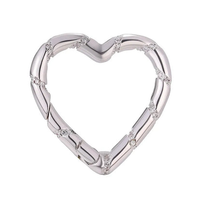 Copper heart-shaped climbing button with gold plating and zircon detail, measuring 1.5cm