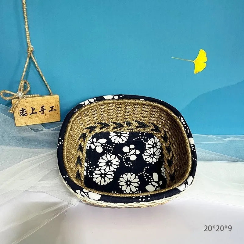 Blue square plastic hand-woven storage basket on a tabletop.