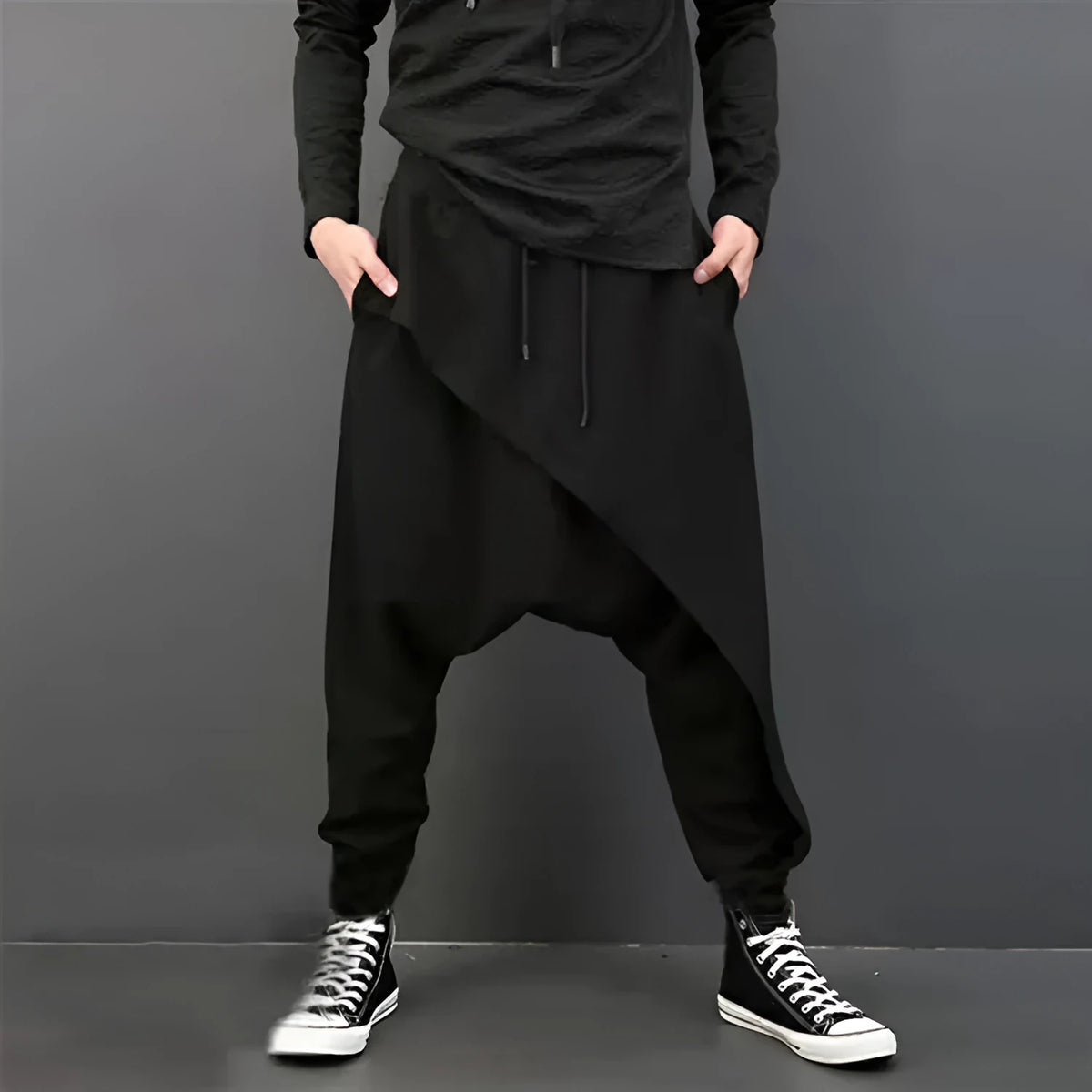 Loose harem pants in black, grey, and light grey cotton with drop crotch and baggy fit