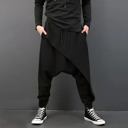 Loose harem pants in black, grey, and light grey cotton with drop crotch and baggy fit
