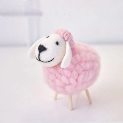 Adorable plush sheep decorations in various sizes and color combinations, perfect for adding a cozy, farmhouse-inspired touch to any home.