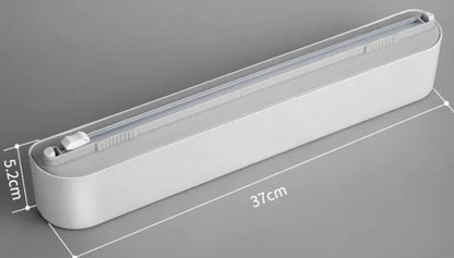 Black and gray plastic wrap dispenser with sharp cutter for kitchen