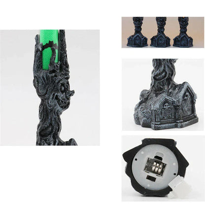 Spooky Halloween LED candle decoration with quirky hand-holding design and warm white lighting