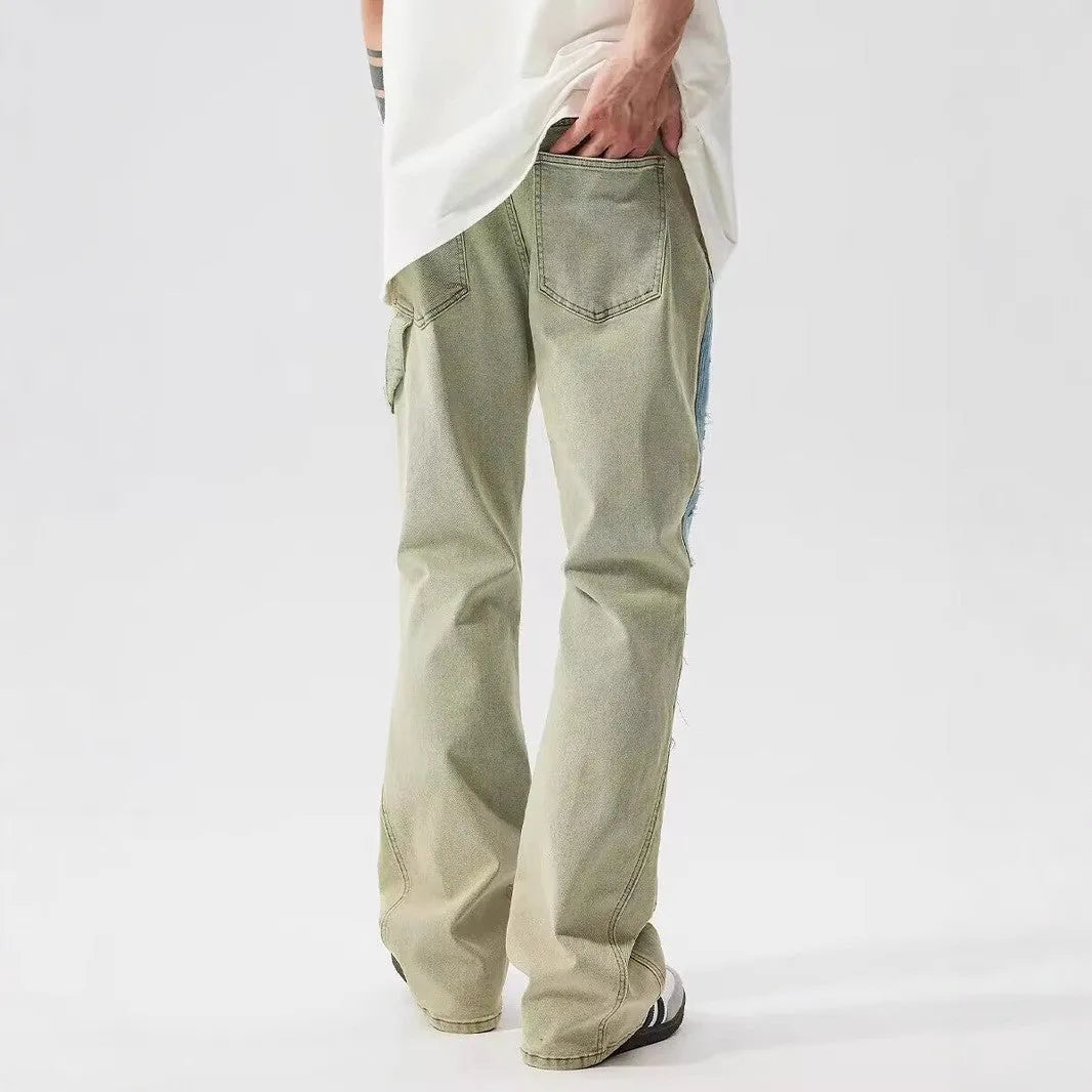 Yellow and blue patchwork splash-ink damaged design denim jeans with mid-waist cut and zip placket closure