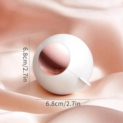 White, pink, green, and deep pink coloured ABS hair removal ball with a handle for pet hair and lint.