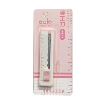 Small plastic blade art knife in five colours measuring 7.2cm long